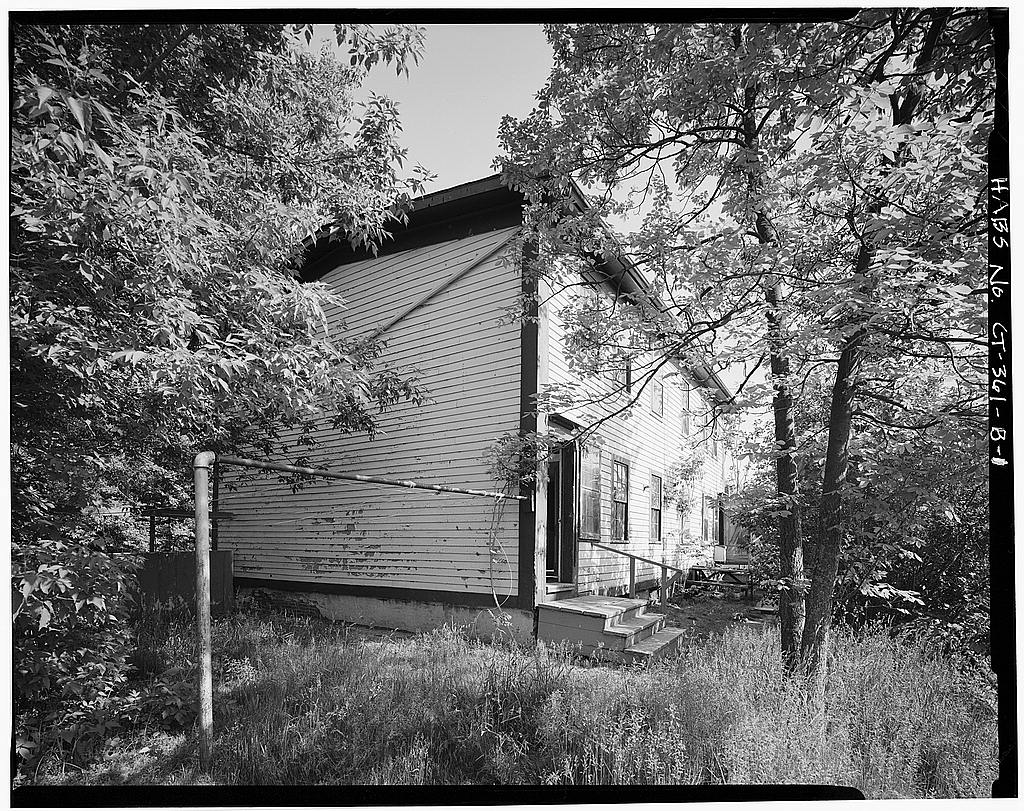 View southeast, north and west (front) elevations