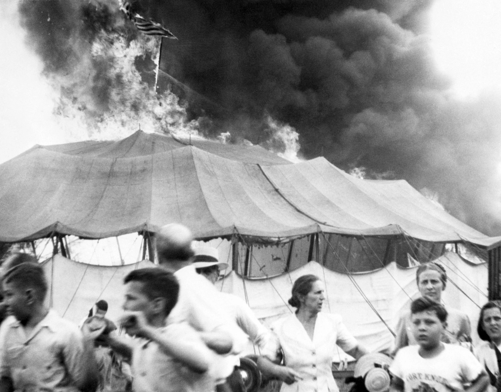 Spectators escaping the burning circus tent — July 6, 1944
