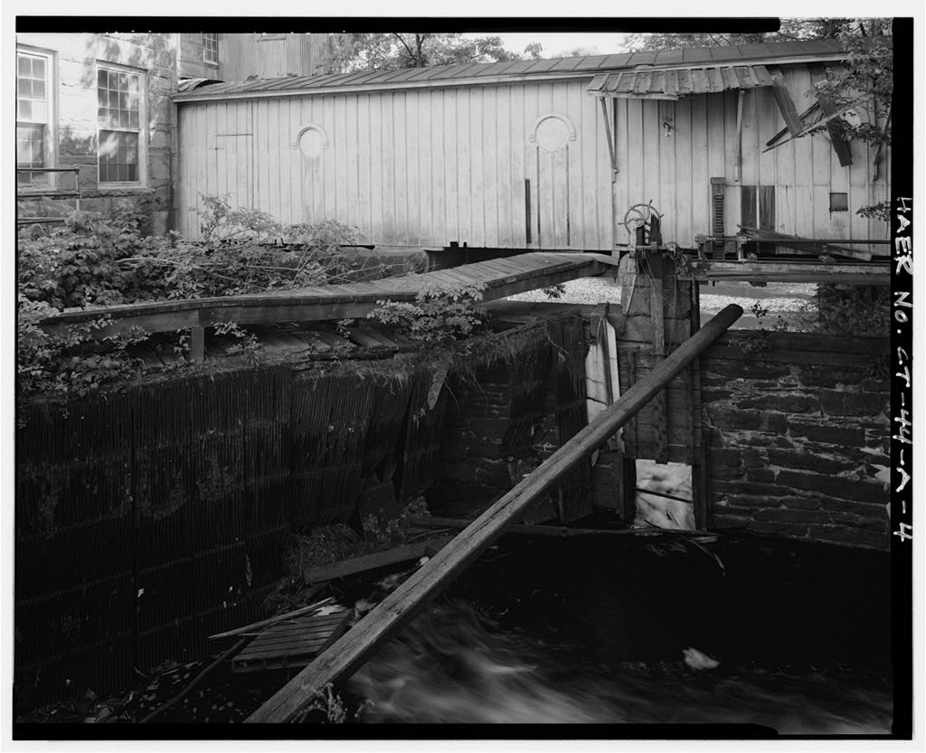 View south of trash racks (left) and sluice gates (right)