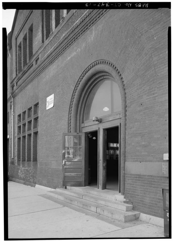 Oblique view of passenger entrance in north facade