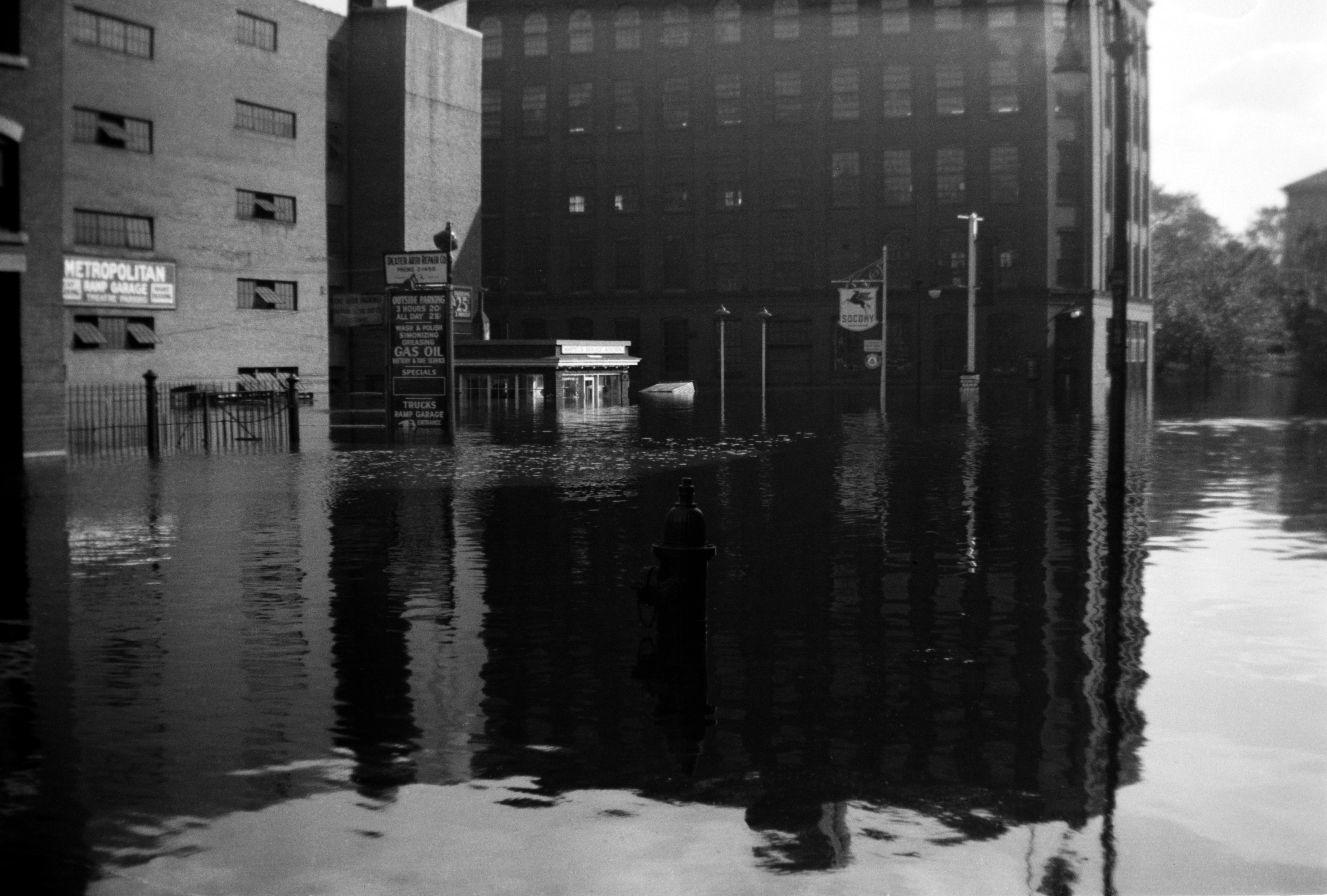 Floodwater surrounding downtown buildings